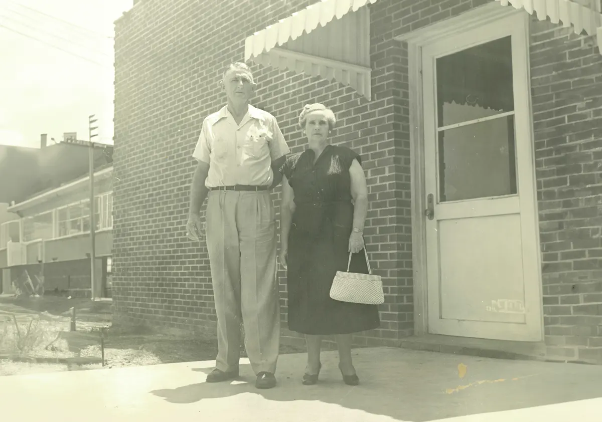 D.L. and Estelle Fail outside the telephone office