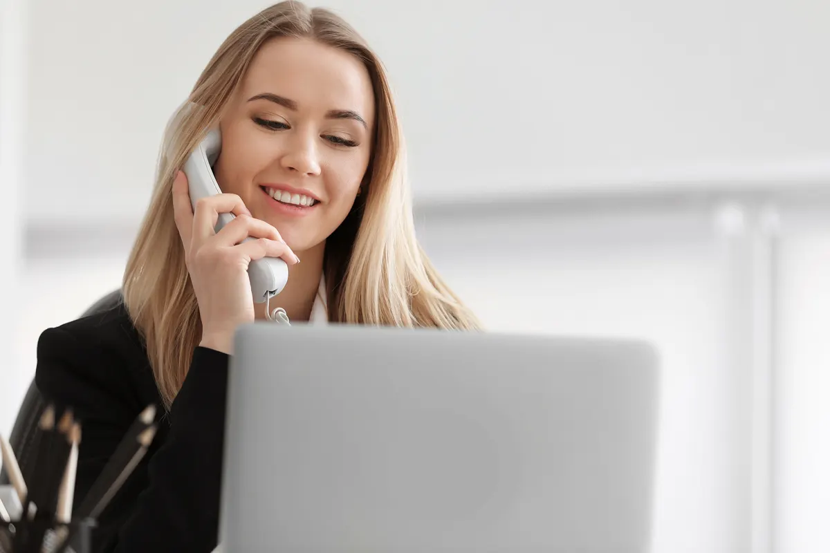 Woman talking on Arriva home phone